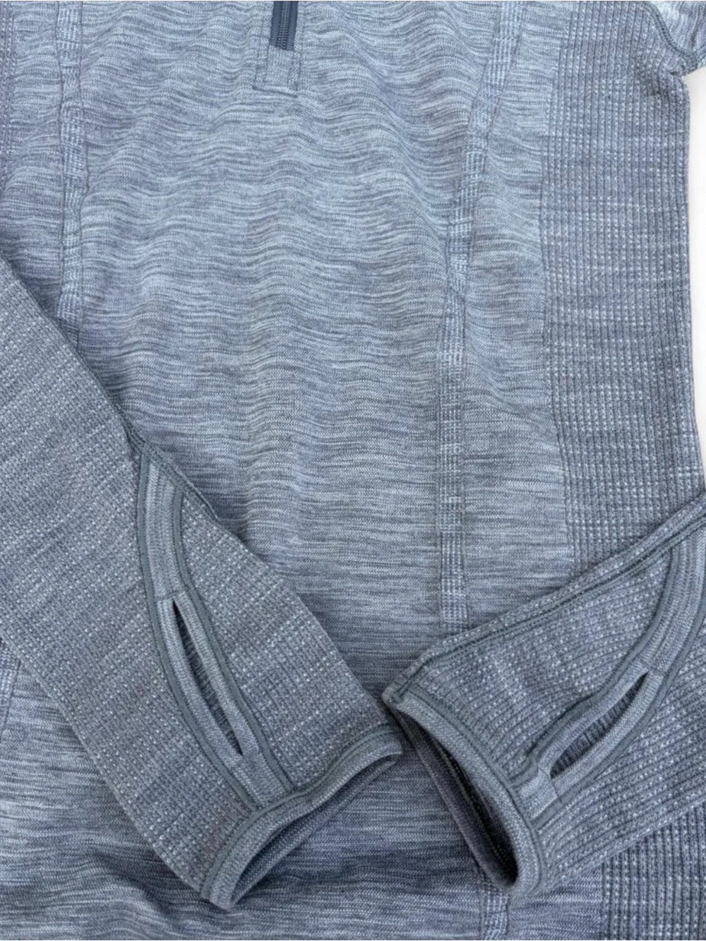 The Lululemon Women’s Sz. 6 Swiftly Tech Wool Pullover in heather gray